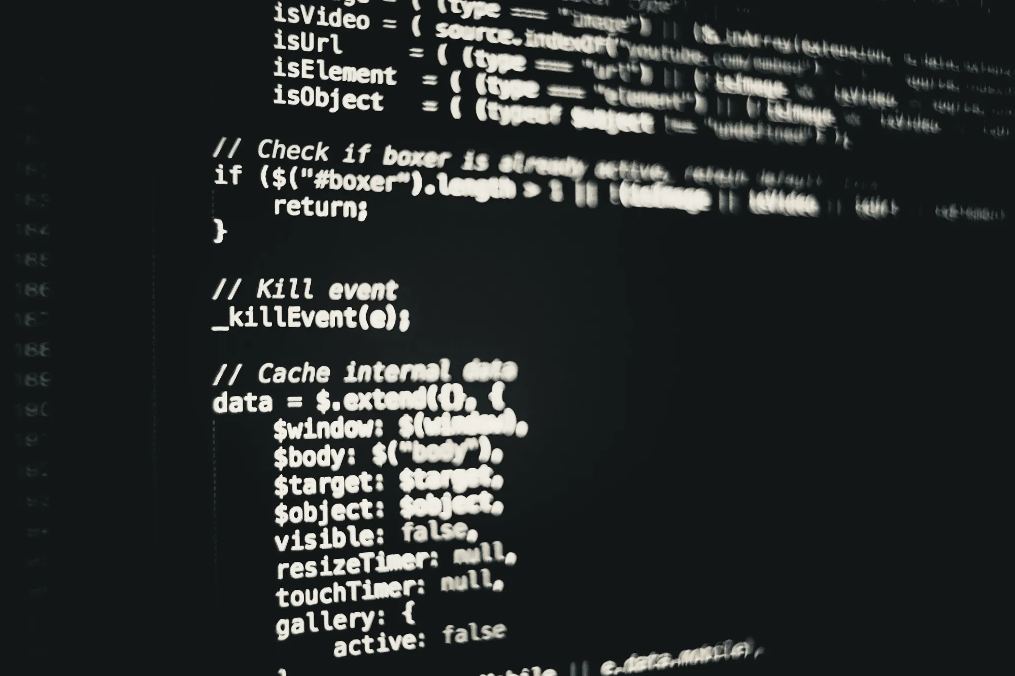 Code editor displaying syntax-highlighted code on a dark screen